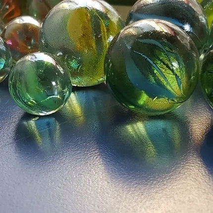 25 Bolones + 100 Canicas Ojos De Gato Vidrio Bolitas Tiritos